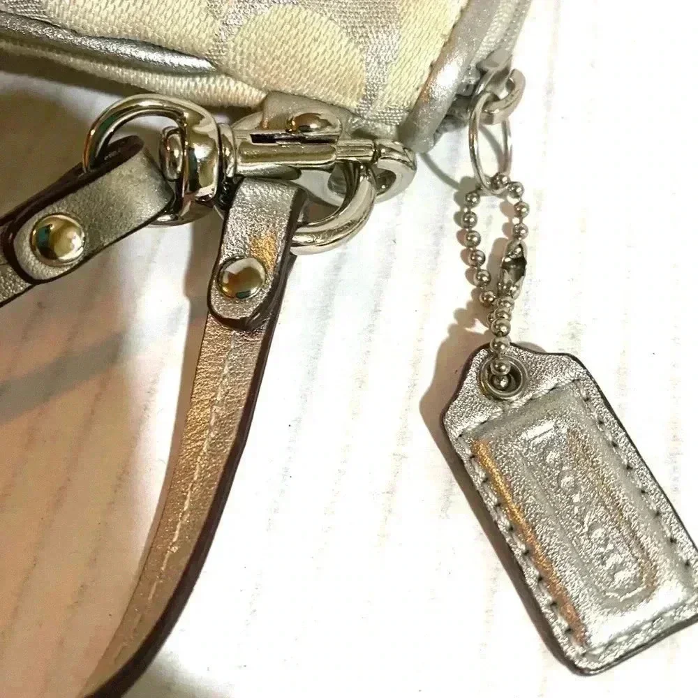 Coach CC signature print canvas wristlet bag